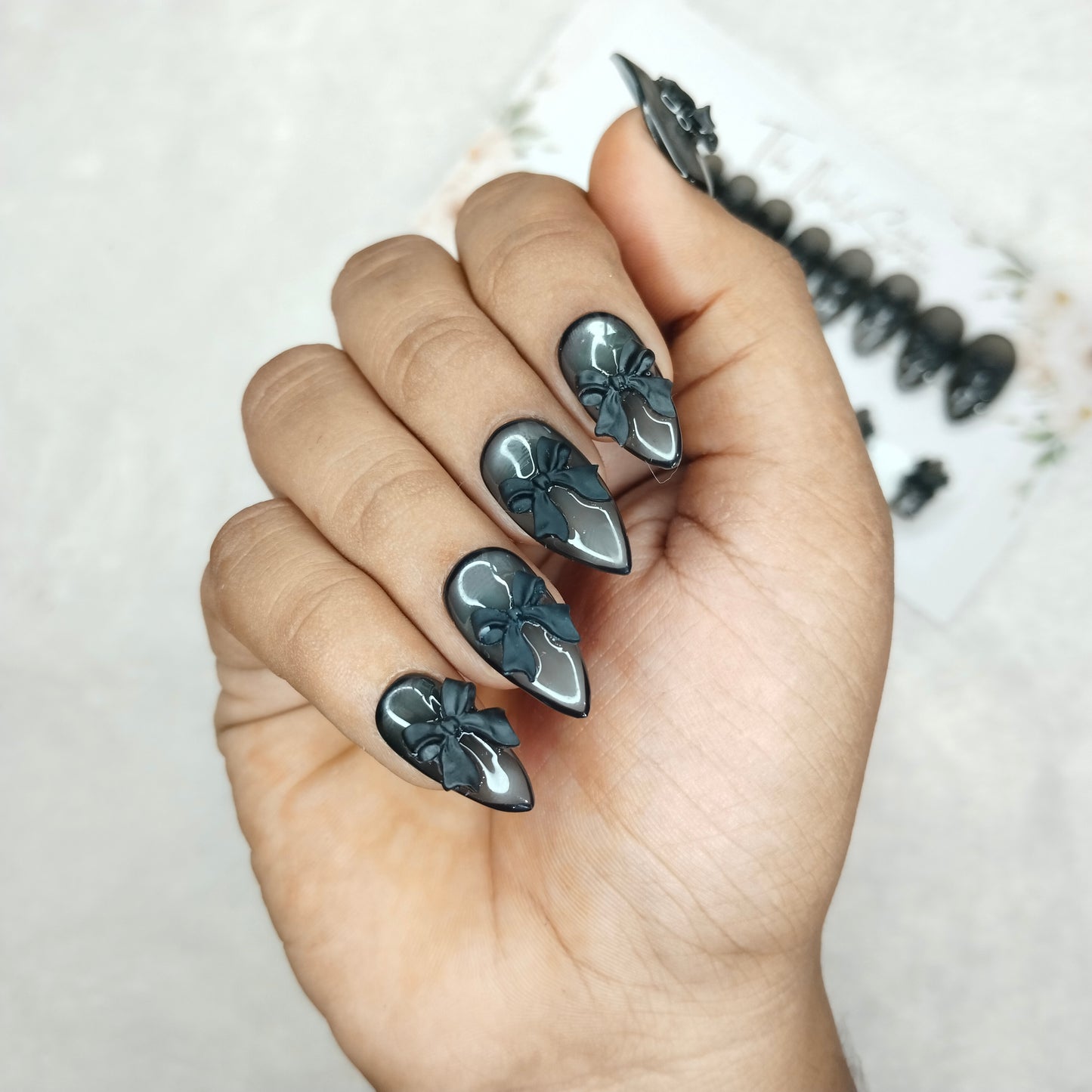 The NailzStation Glossy Black 3D Bow Press on Fake Artificial Nails Set with glue, filer, sticker application kit // 1398