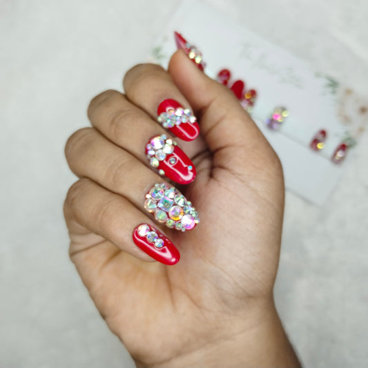 The NailzStation Glossy Red Studded Press on Fake Artificial Nails Set with glue, filer, sticker application kit // 1396