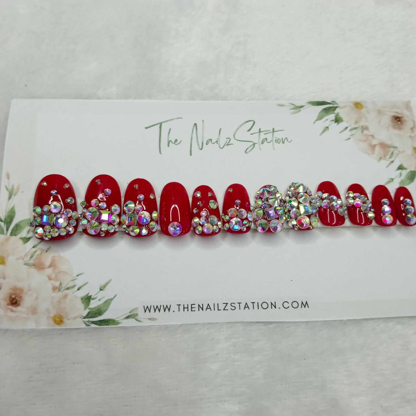 The NailzStation Glossy Red Studded Press on Fake Artificial Nails Set with glue, filer, sticker application kit // 1396