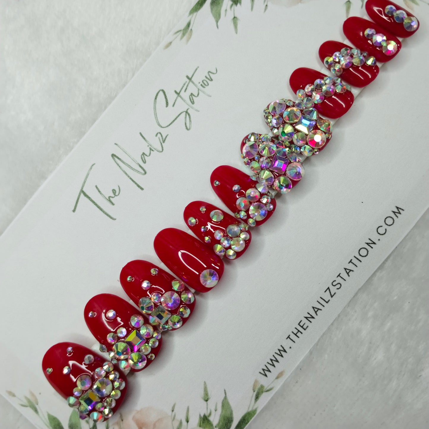 The NailzStation Glossy Red Studded Press on Fake Artificial Nails Set with glue, filer, sticker application kit // 1396