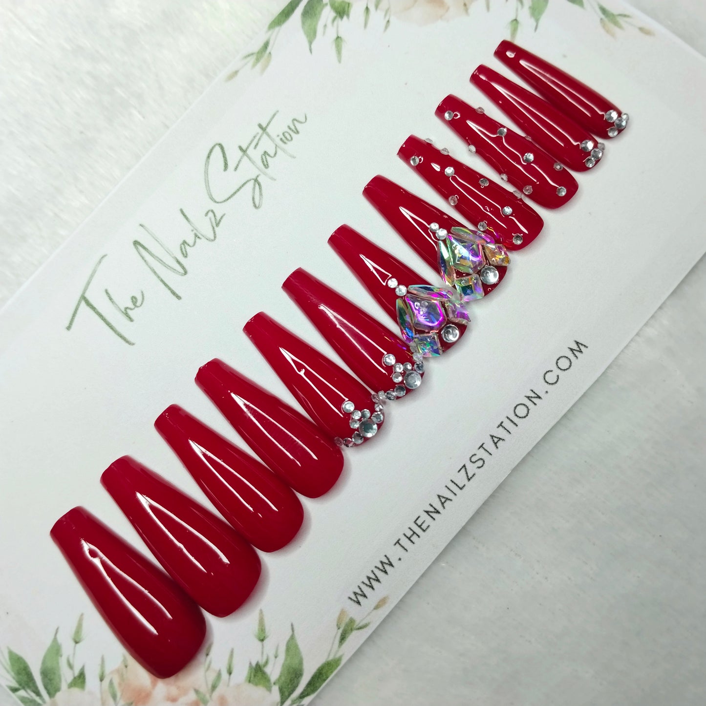 The NailzStation Glossy Red Studded Press on Fake Artificial Nails Set with glue, filer, sticker application kit // 1480