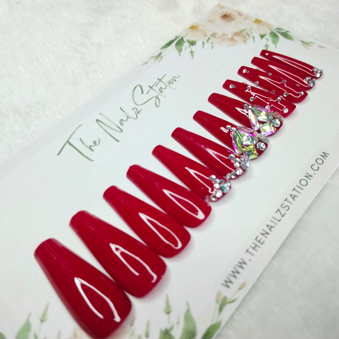 The NailzStation Glossy Red Studded Press on Fake Artificial Nails Set with glue, filer, sticker application kit // 1480