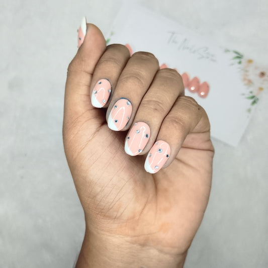 The NailzStation Glossy Nude Studded French Press on Fake Artificial Nails Set with glue, filer, sticker application kit // 1486