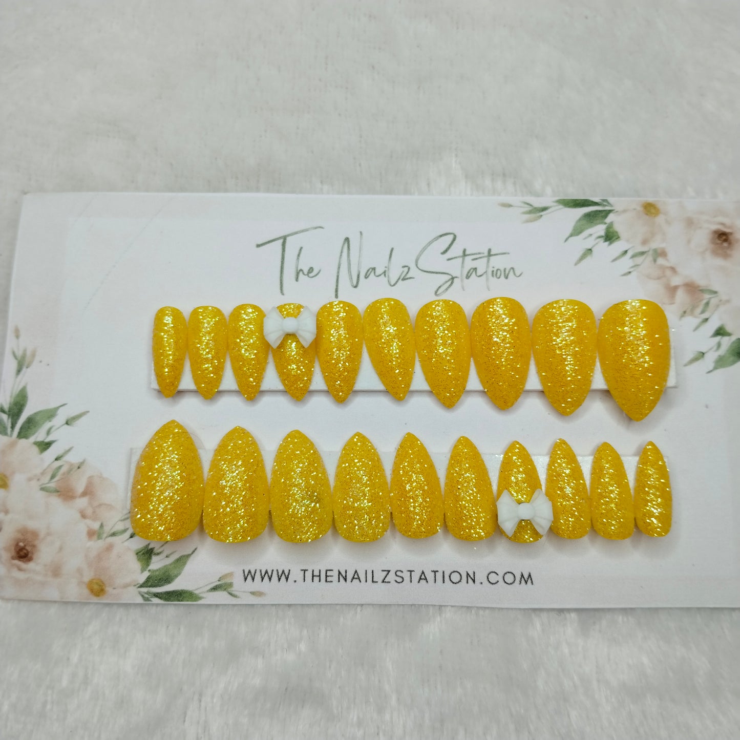The NailzStation Glossy Yellow Glitter 3D Bow Press on Fake Artificial Nails Set with glue, filer, sticker application kit // 1444