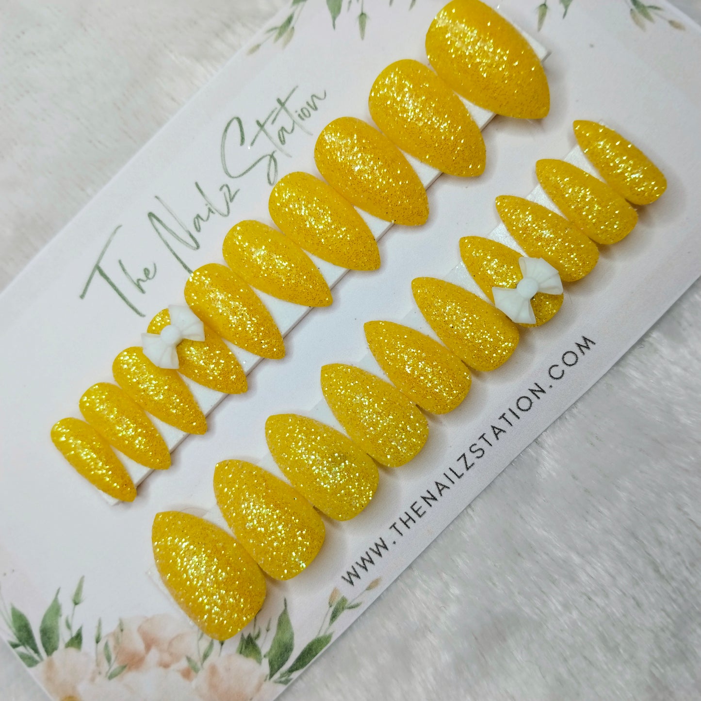 The NailzStation Glossy Yellow Glitter 3D Bow Press on Fake Artificial Nails Set with glue, filer, sticker application kit // 1444