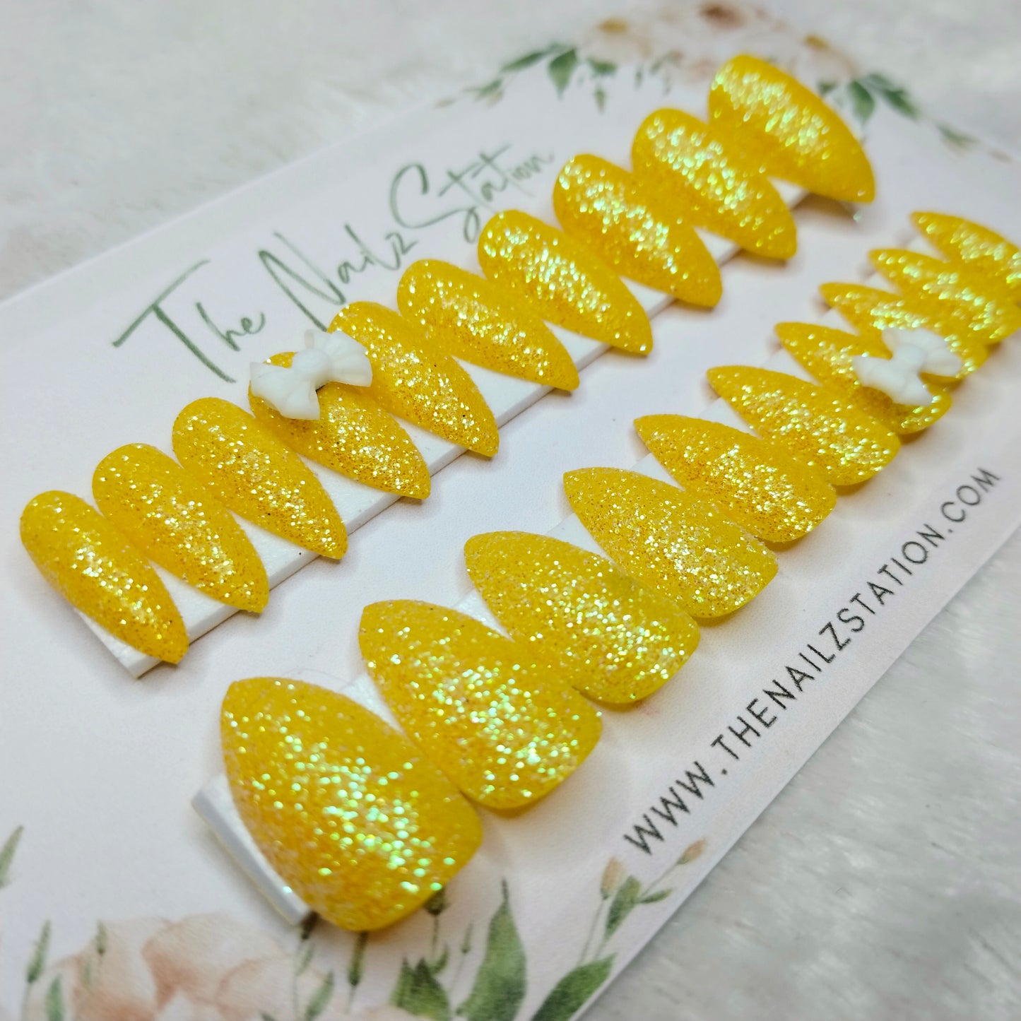 The NailzStation Glossy Yellow Glitter 3D Bow Press on Fake Artificial Nails Set with glue, filer, sticker application kit // 1444