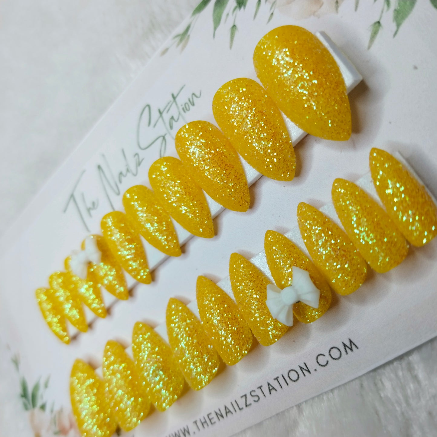 The NailzStation Glossy Yellow Glitter 3D Bow Press on Fake Artificial Nails Set with glue, filer, sticker application kit // 1444