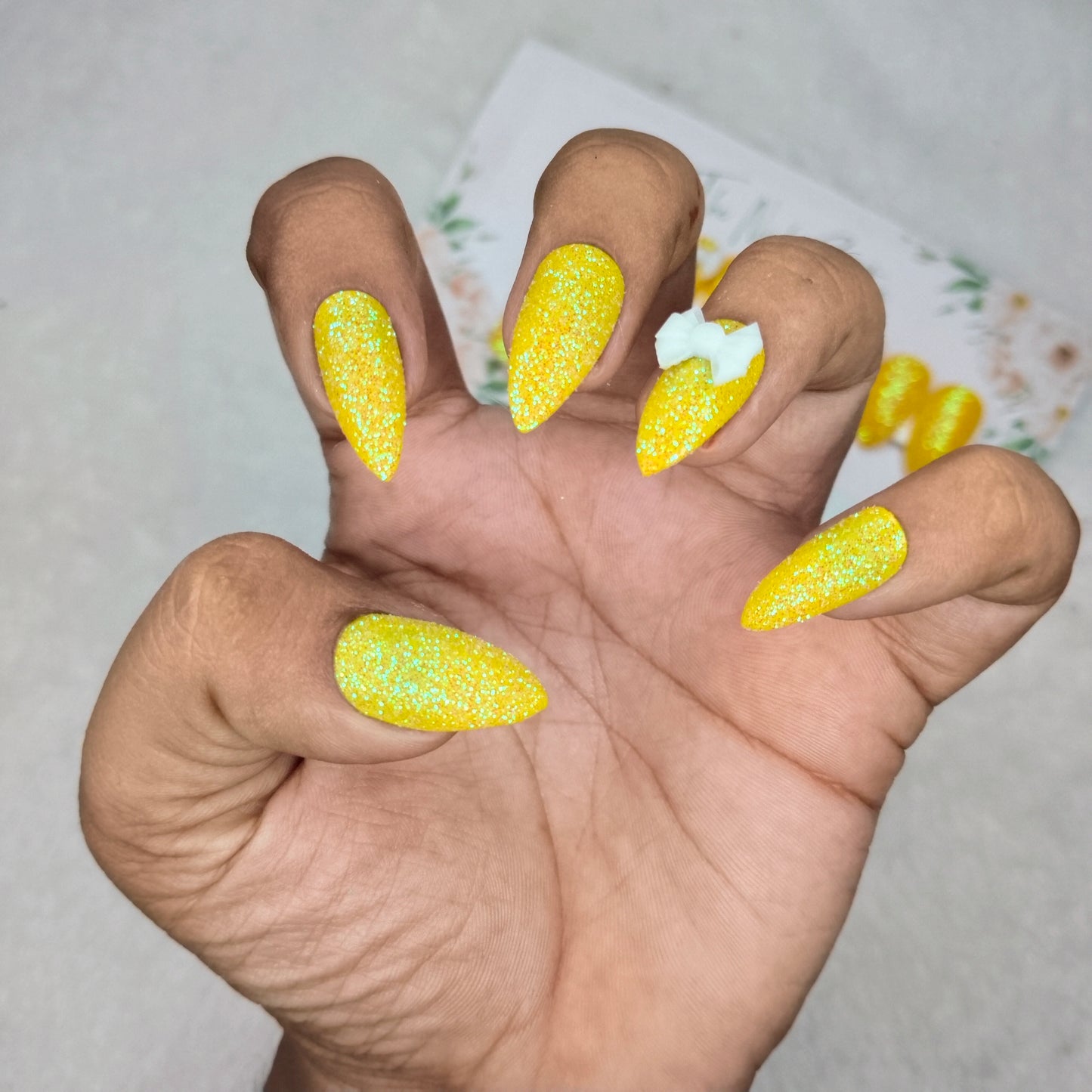 The NailzStation Glossy Yellow Glitter 3D Bow Press on Fake Artificial Nails Set with glue, filer, sticker application kit // 1444