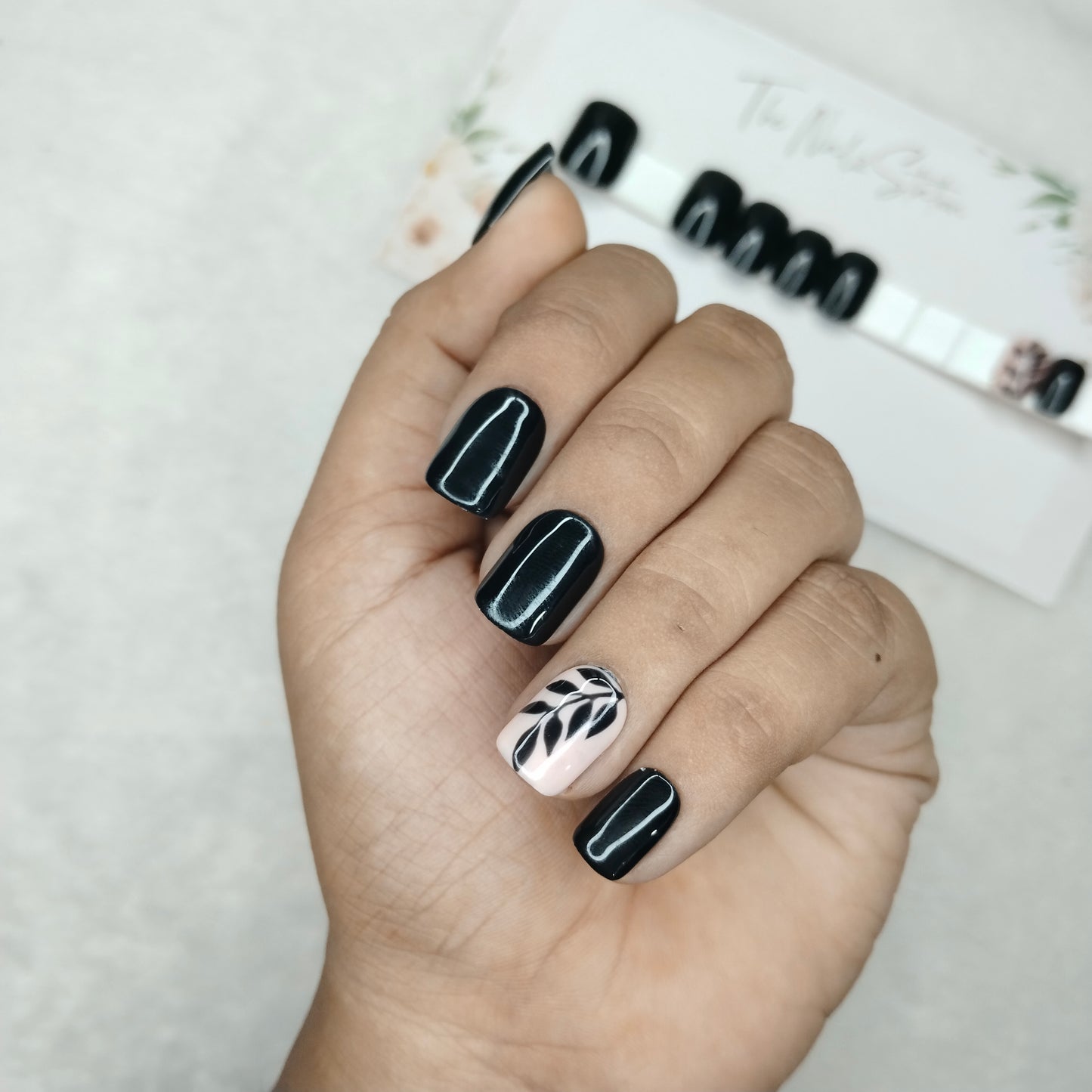 The NailzStation Glossy Black Floral Press on Fake Artificial Nails Set with glue, filer, sticker application kit // 1448