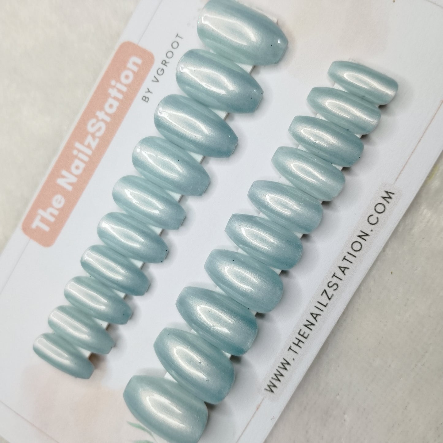 The NailzStation Glossy Light Blue Chrome Press on Fake Artificial Nails Set with glue, filer, sticker application kit // 1469