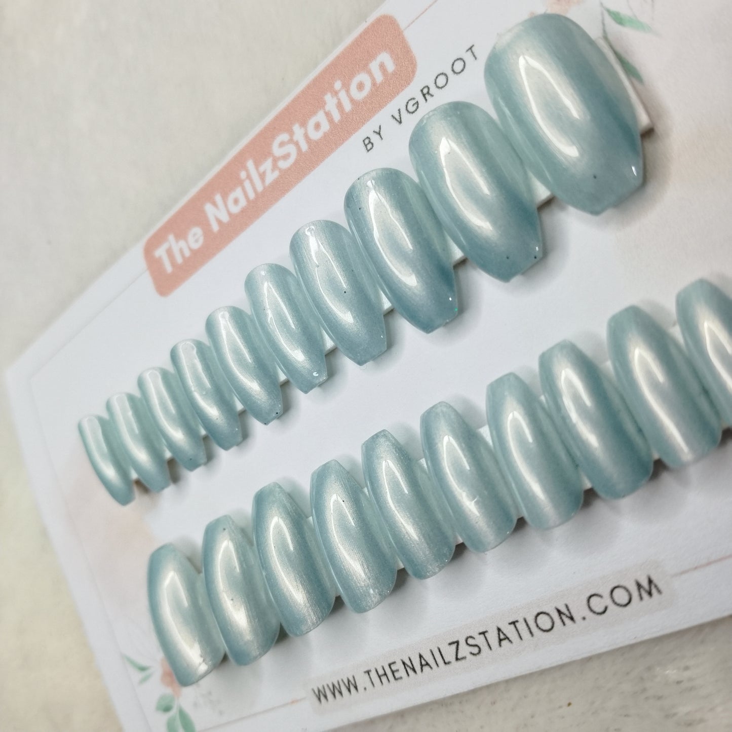 The NailzStation Glossy Light Blue Chrome Press on Fake Artificial Nails Set with glue, filer, sticker application kit // 1469