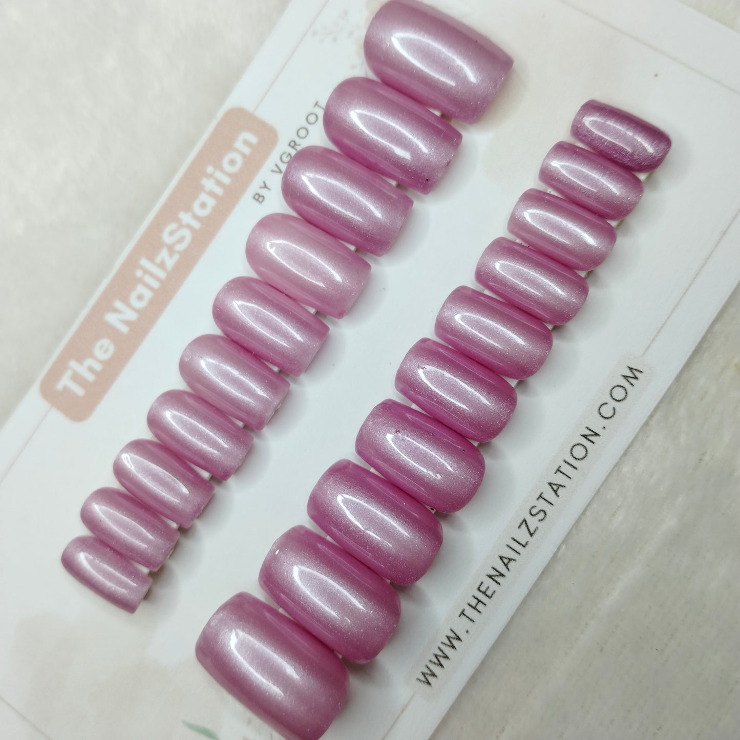 The NailzStation Glossy Pink Chrome Press on Fake Artificial Nails Set with glue, filer, sticker application kit // 1475