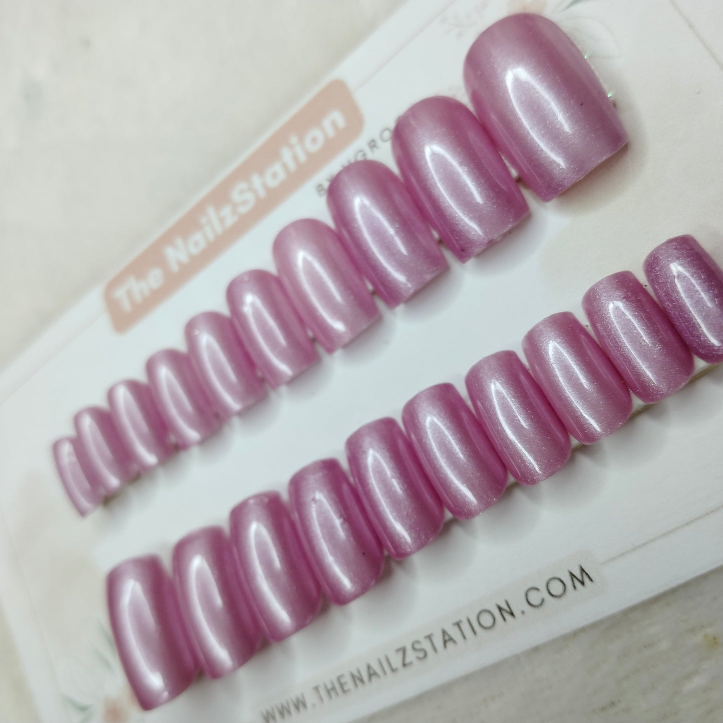 The NailzStation Glossy Pink Chrome Press on Fake Artificial Nails Set with glue, filer, sticker application kit // 1475