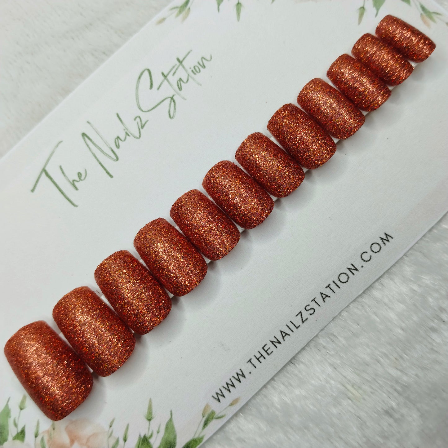 The NailzStation Glossy Orange Glitter Press on Fake Artificial Nails Set with glue, filer, sticker application kit // 1482