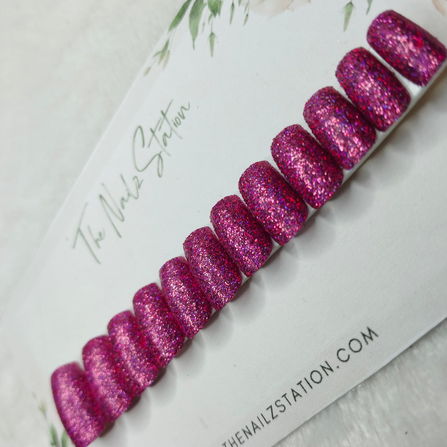 The NailzStation Glossy Pink Glitter Press on Fake Artificial Nails Set with glue, filer, sticker application kit // 1487