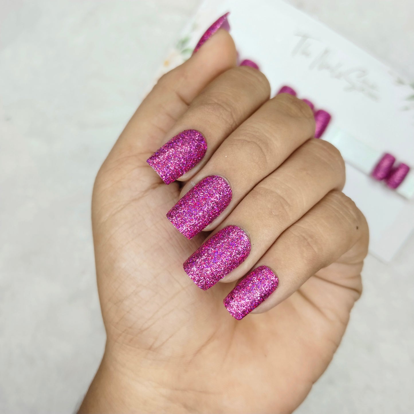 The NailzStation Glossy Pink Glitter Press on Fake Artificial Nails Set with glue, filer, sticker application kit // 1487