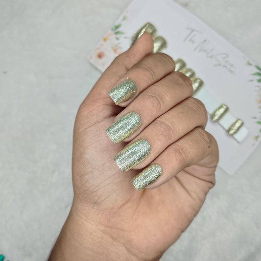 The NailzStation Glossy Water Gold Glitter Press on Fake Artificial Nails Set with glue, filer, sticker application kit // 1488