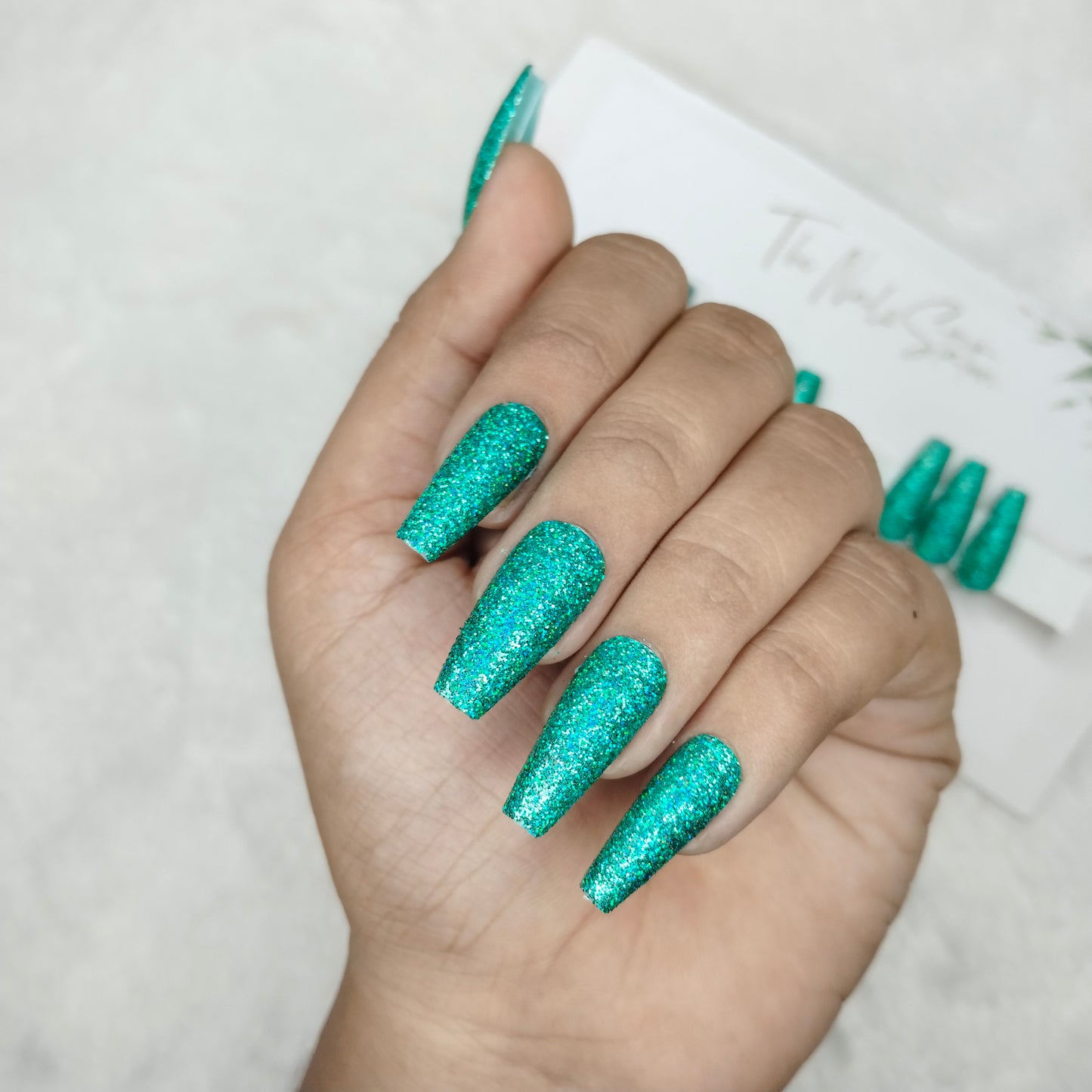 The NailzStation Glossy Green Glitter Press on Fake Artificial Nails Set with glue, filer, sticker application kit // 1490