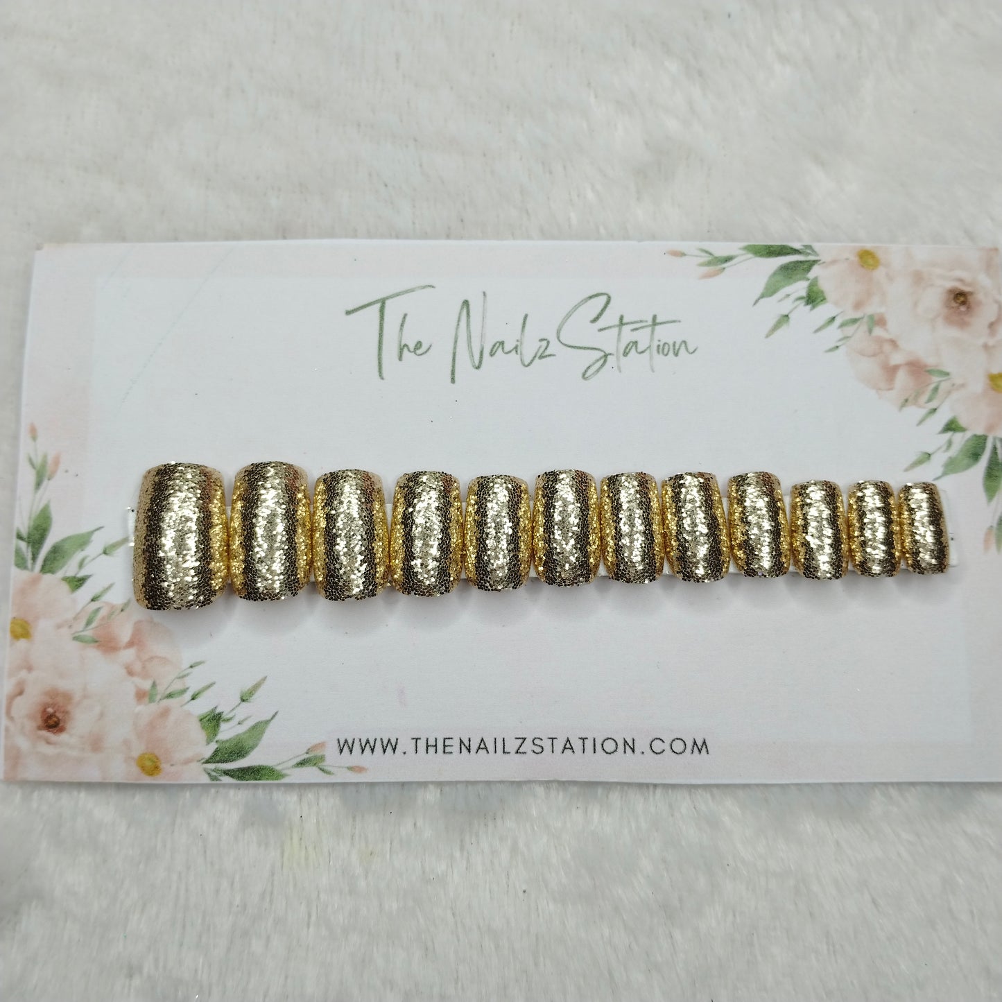 The NailzStation Glossy Golden Glitter Press on Fake Artificial Nails Set with glue, filer, sticker application kit // 1494