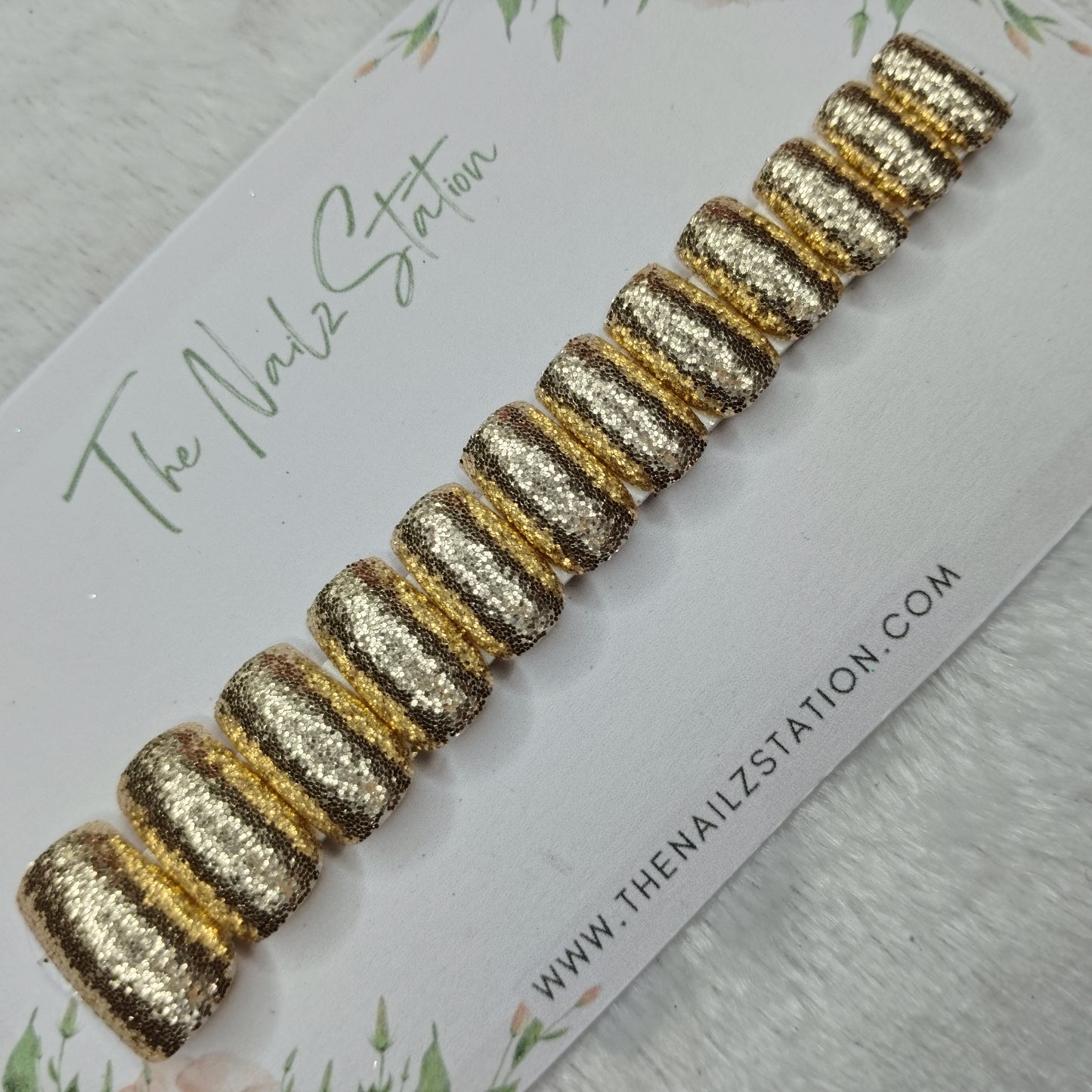 The NailzStation Glossy Golden Glitter Press on Fake Artificial Nails Set with glue, filer, sticker application kit // 1494