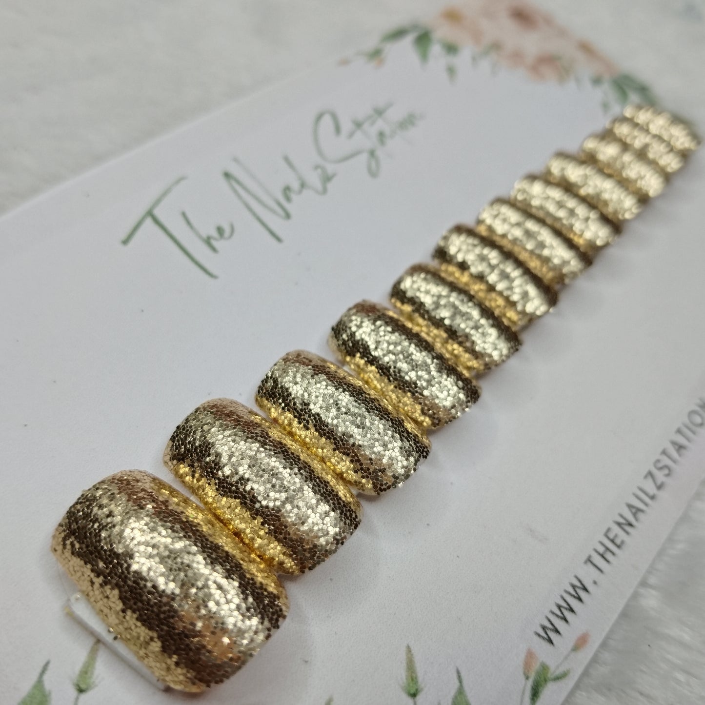 The NailzStation Glossy Golden Glitter Press on Fake Artificial Nails Set with glue, filer, sticker application kit // 1494