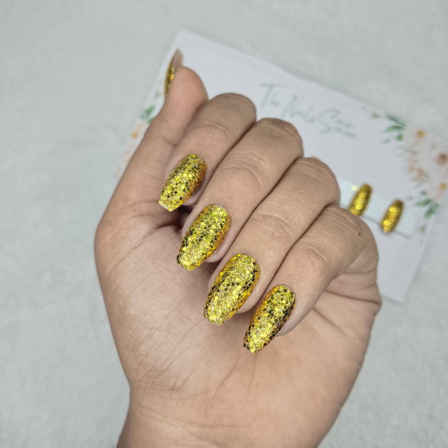 The NailzStation Glossy Yellow Golden Glitter Press on Fake Artificial Nails Set with glue, filer, sticker application kit // 1498