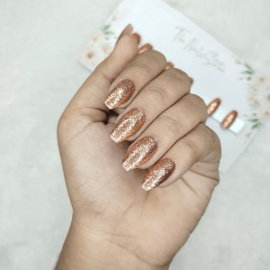 The NailzStation Glossy Peach Glitter Press on Fake Artificial Nails Set with glue, filer, sticker application kit // 1500