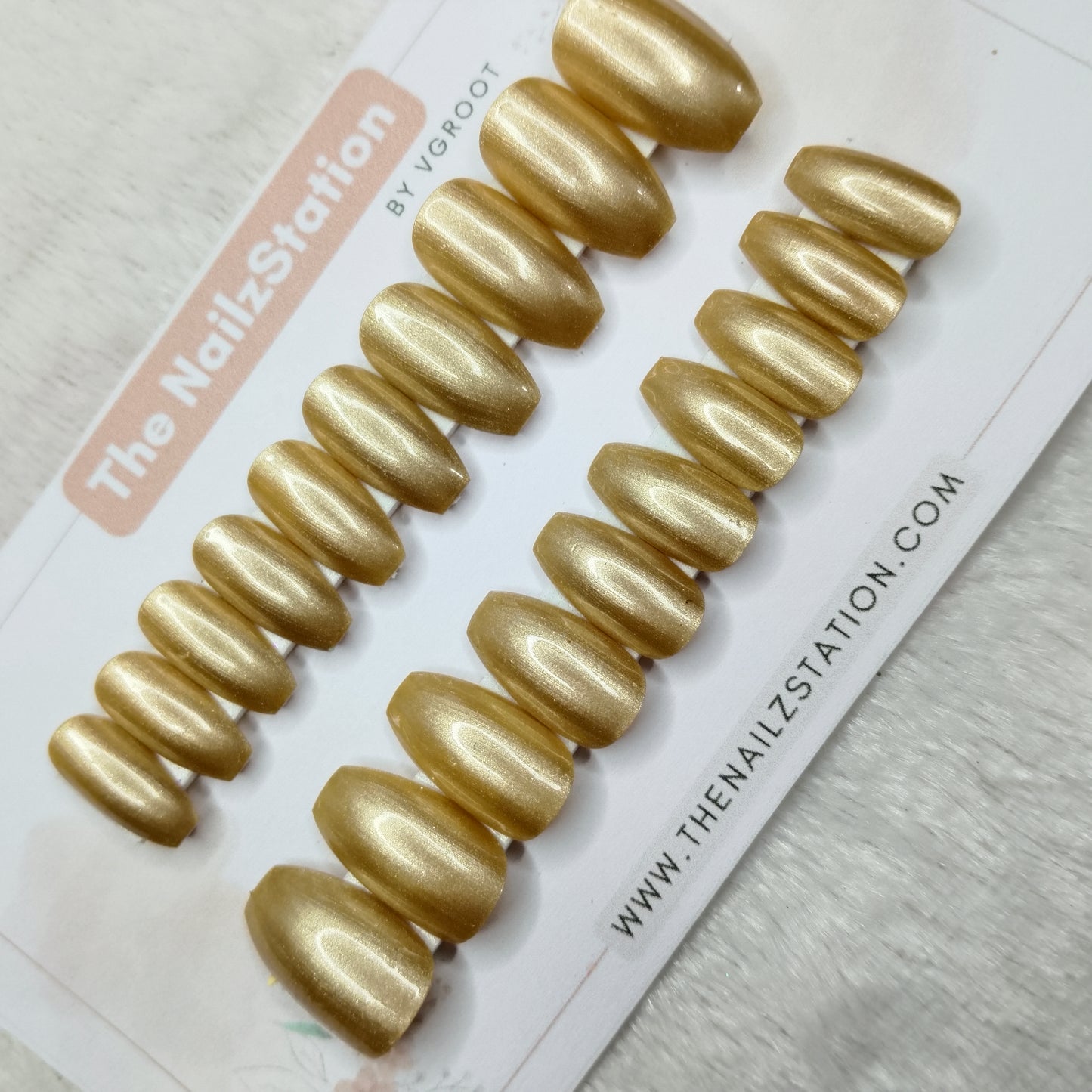 The NailzStation Glossy Golden Chrome Press on Fake Artificial Nails Set with glue, filer, sticker application kit // 1507