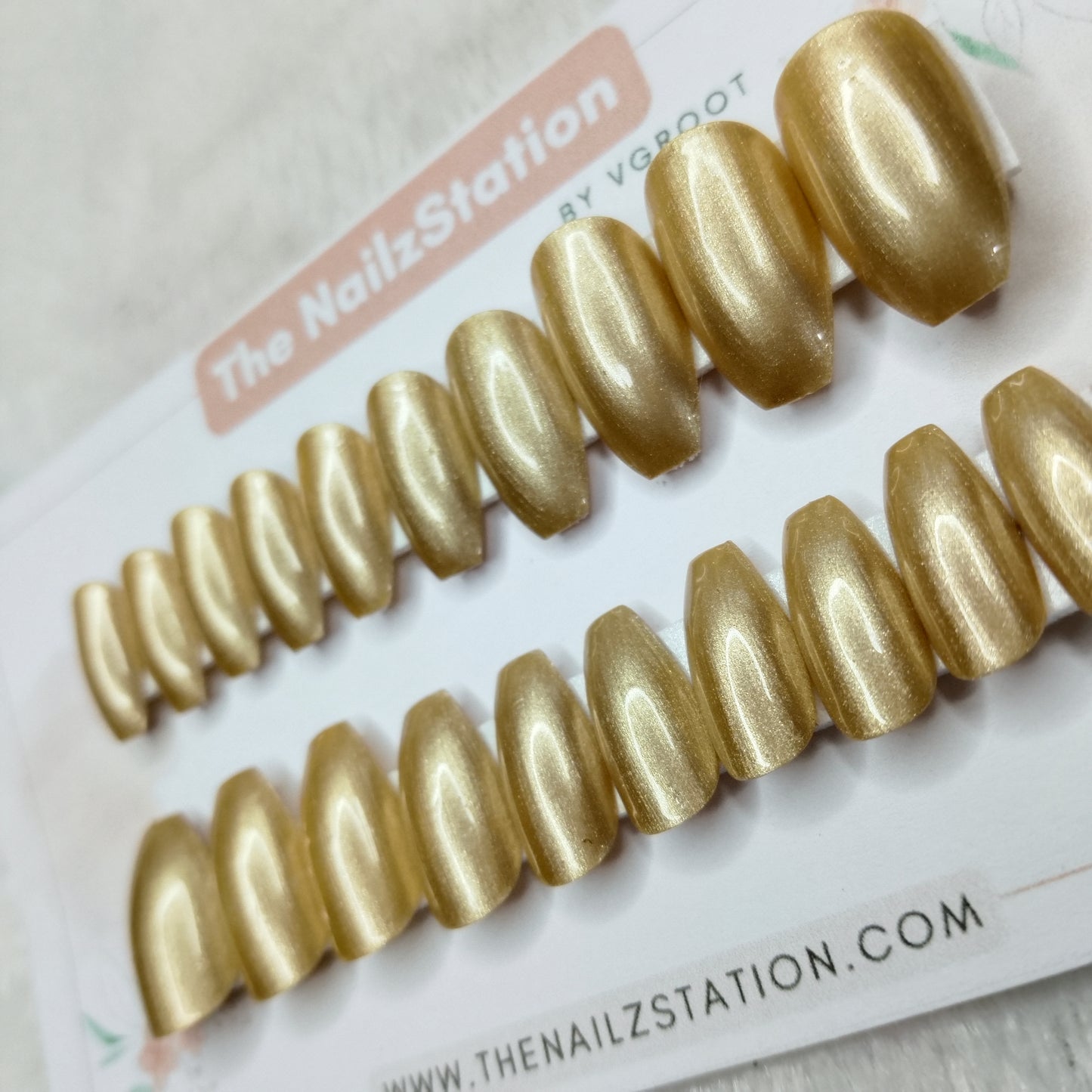 The NailzStation Glossy Golden Chrome Press on Fake Artificial Nails Set with glue, filer, sticker application kit // 1507