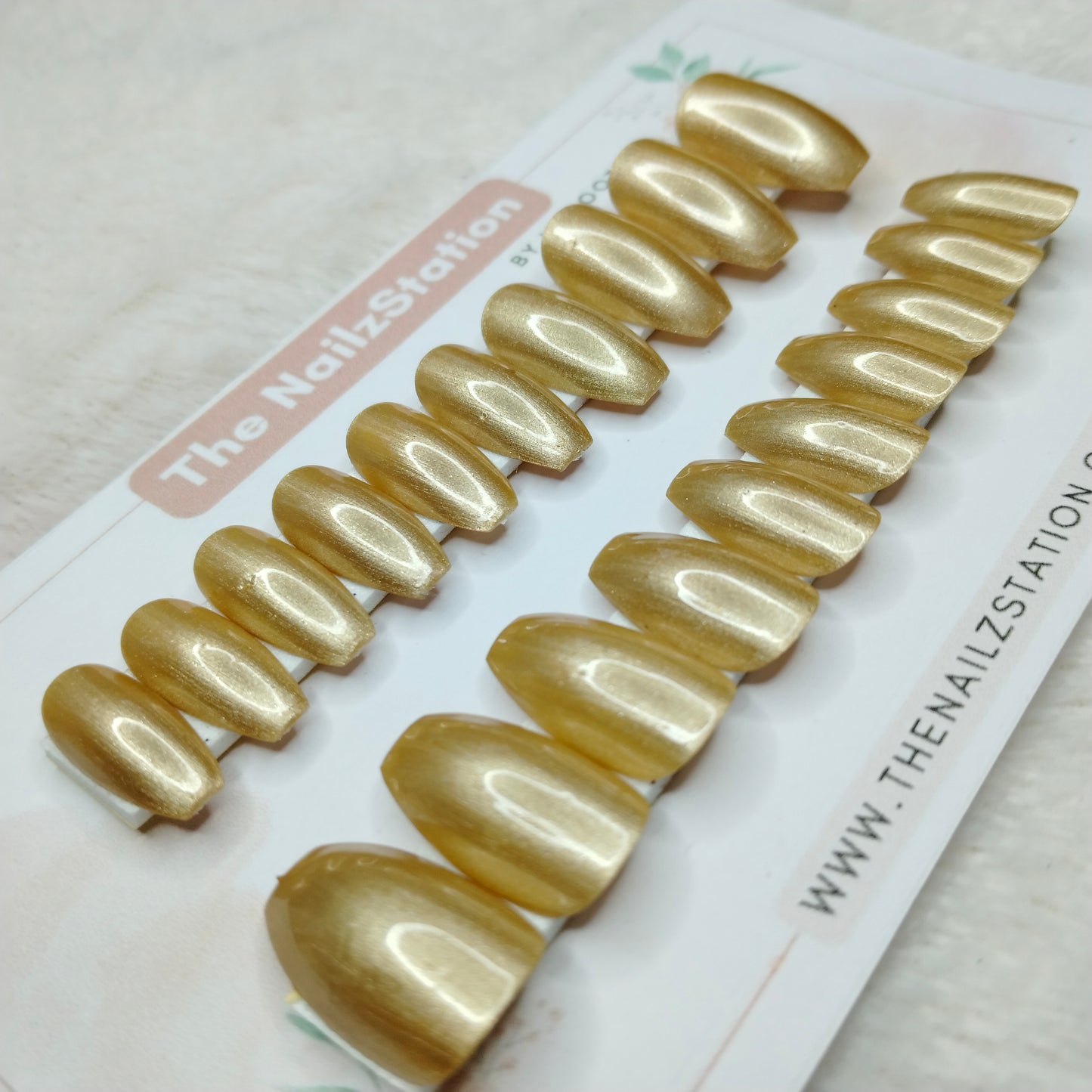 The NailzStation Glossy Golden Chrome Press on Fake Artificial Nails Set with glue, filer, sticker application kit // 1507