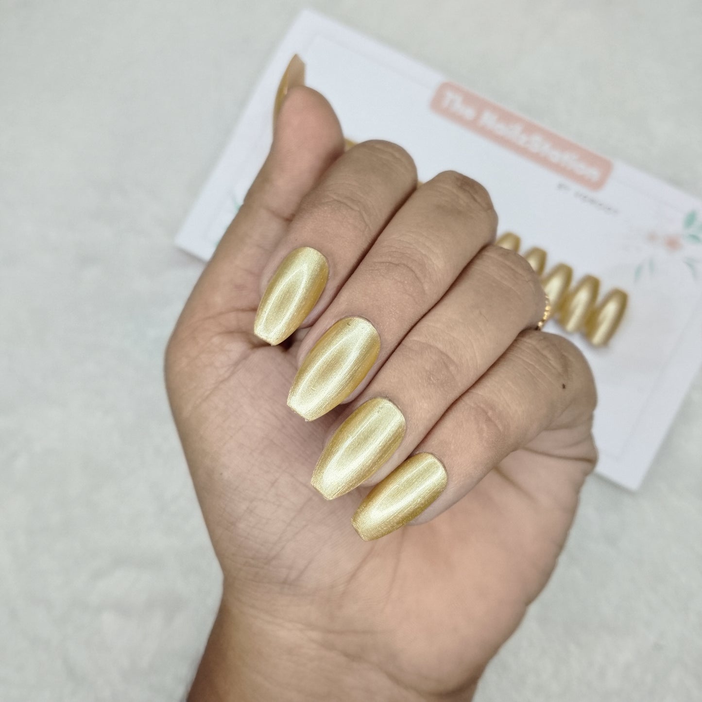 The NailzStation Glossy Golden Chrome Press on Fake Artificial Nails Set with glue, filer, sticker application kit // 1507