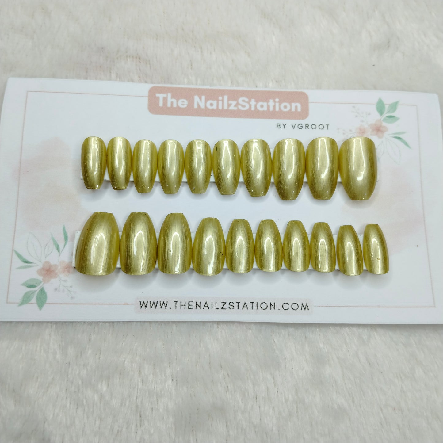 The NailzStation Glossy Gold Chrome Press on Fake Artificial Nails Set with glue, filer, sticker application kit // 1509