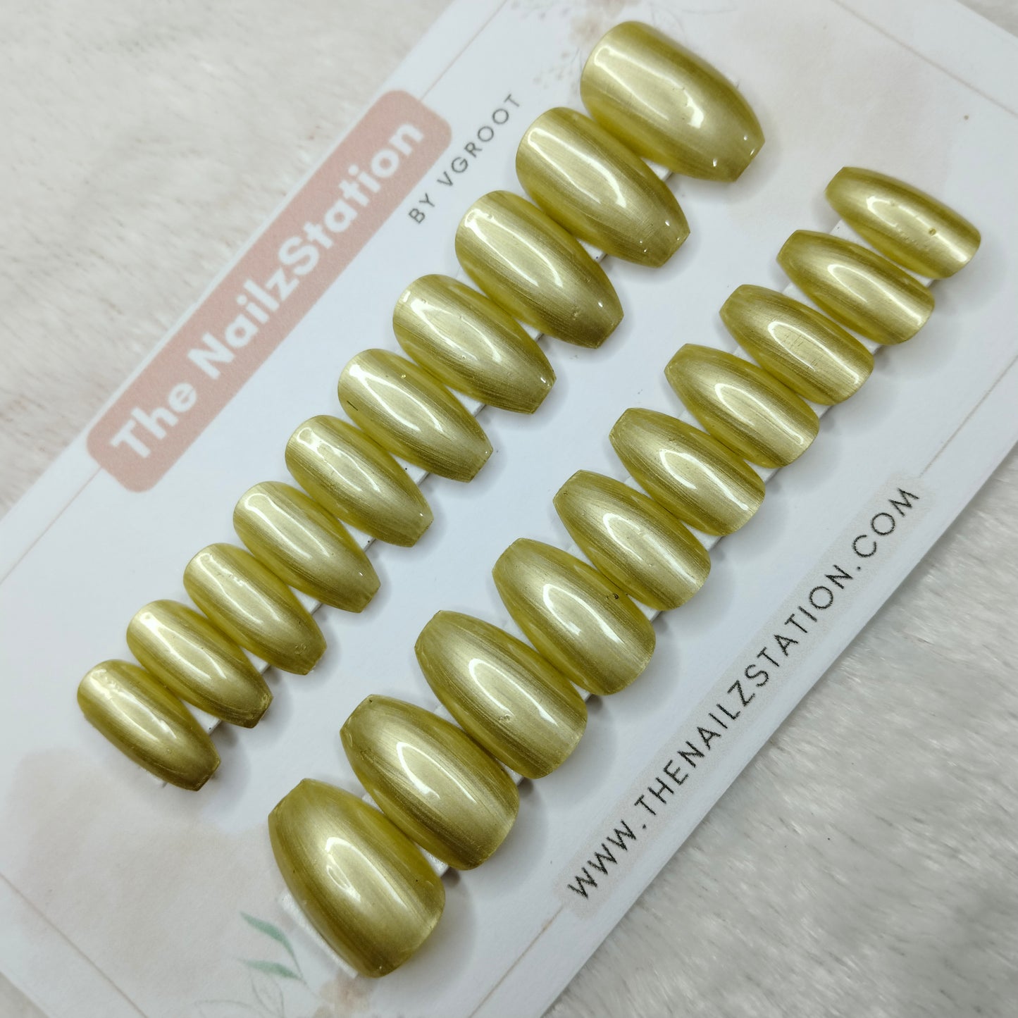 The NailzStation Glossy Gold Chrome Press on Fake Artificial Nails Set with glue, filer, sticker application kit // 1509