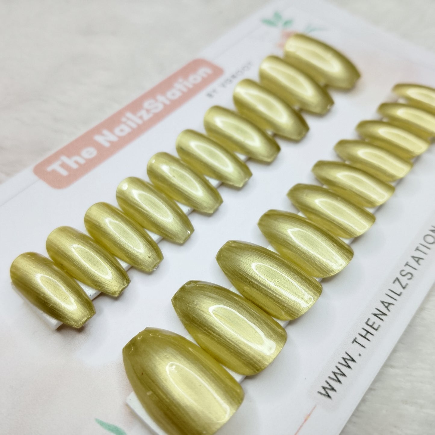 The NailzStation Glossy Gold Chrome Press on Fake Artificial Nails Set with glue, filer, sticker application kit // 1509