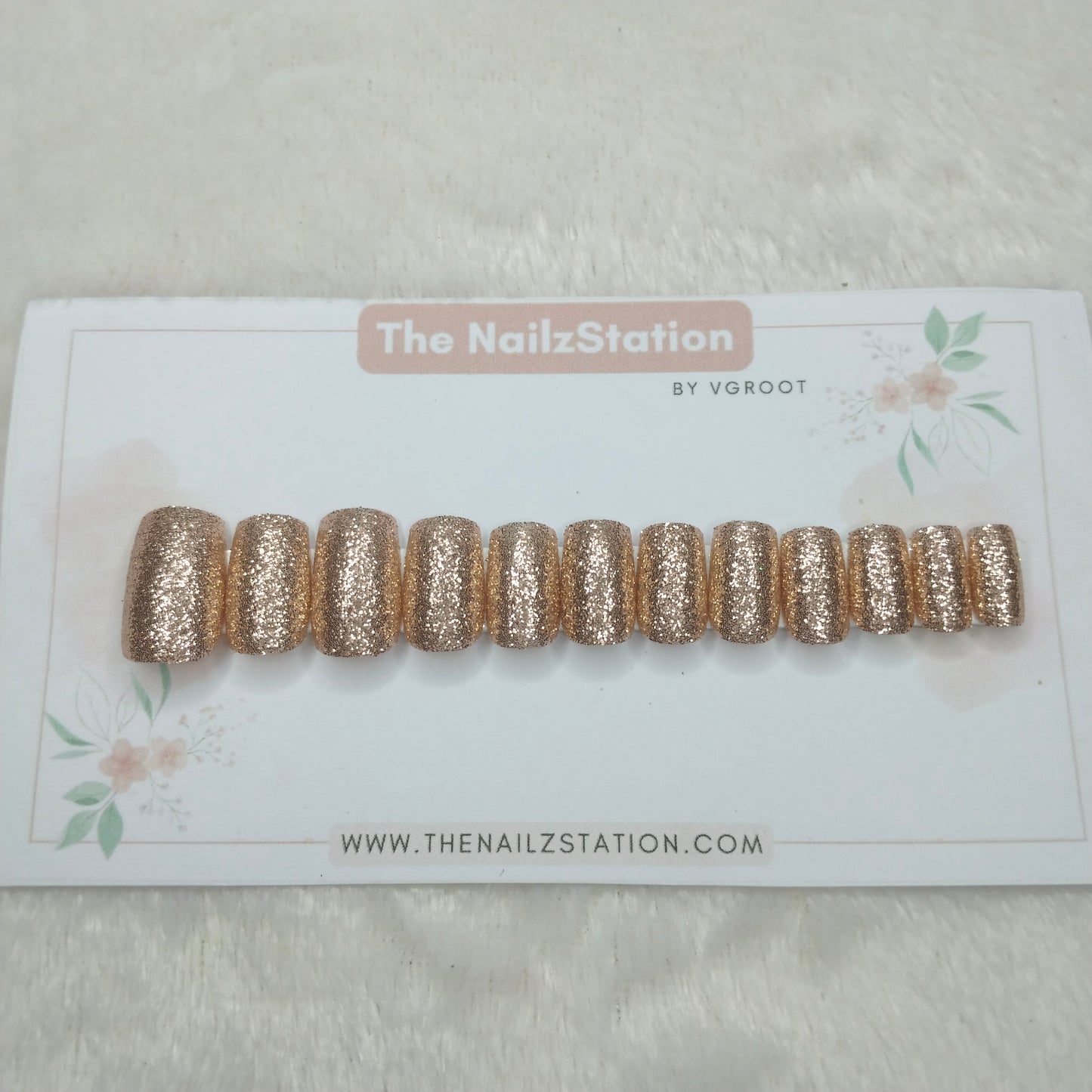 The NailzStation Glossy Golden Glitter Press on Fake Artificial Nails Set with glue, filer, sticker application kit // 1515