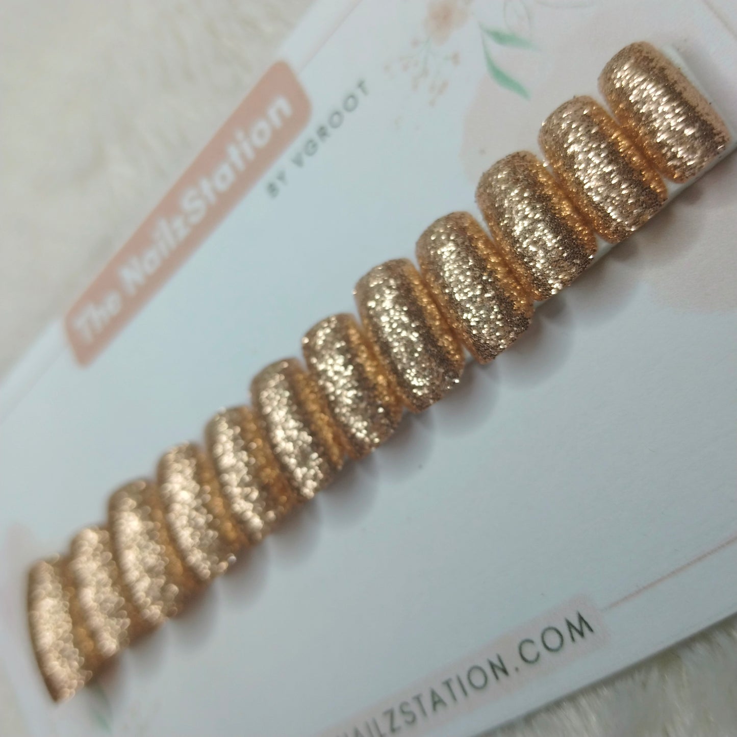 The NailzStation Glossy Golden Glitter Press on Fake Artificial Nails Set with glue, filer, sticker application kit // 1515