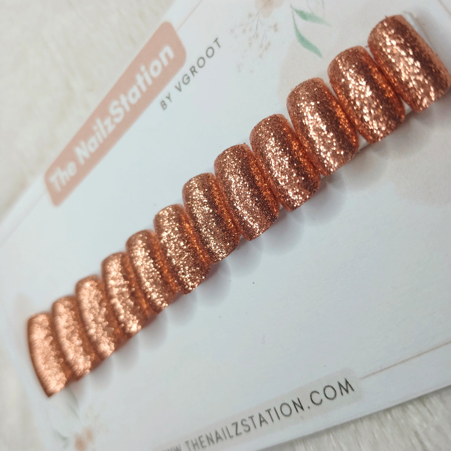 The NailzStation Glossy Peach Chrome Press on Fake Artificial Nails Set with glue, filer, sticker application kit // 1518