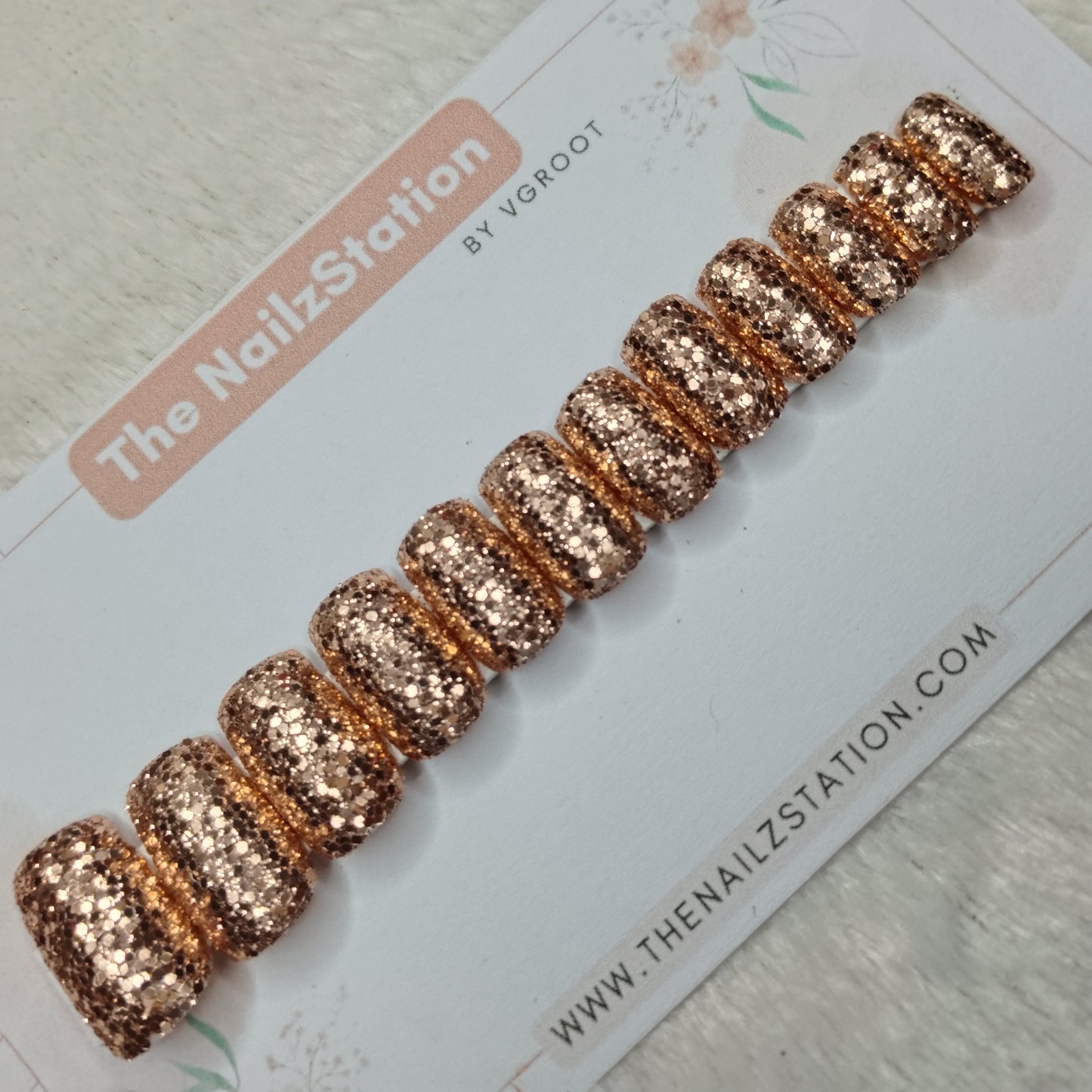 The NailzStation Glossy Golden Glitter  Press on Fake Artificial Nails Set with glue, filer, sticker application kit // 1523