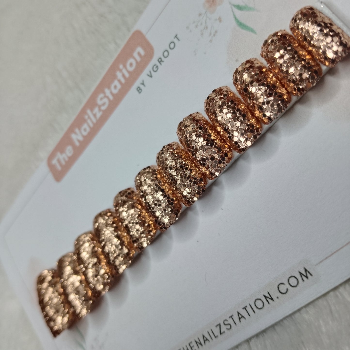 The NailzStation Glossy Golden Glitter  Press on Fake Artificial Nails Set with glue, filer, sticker application kit // 1523