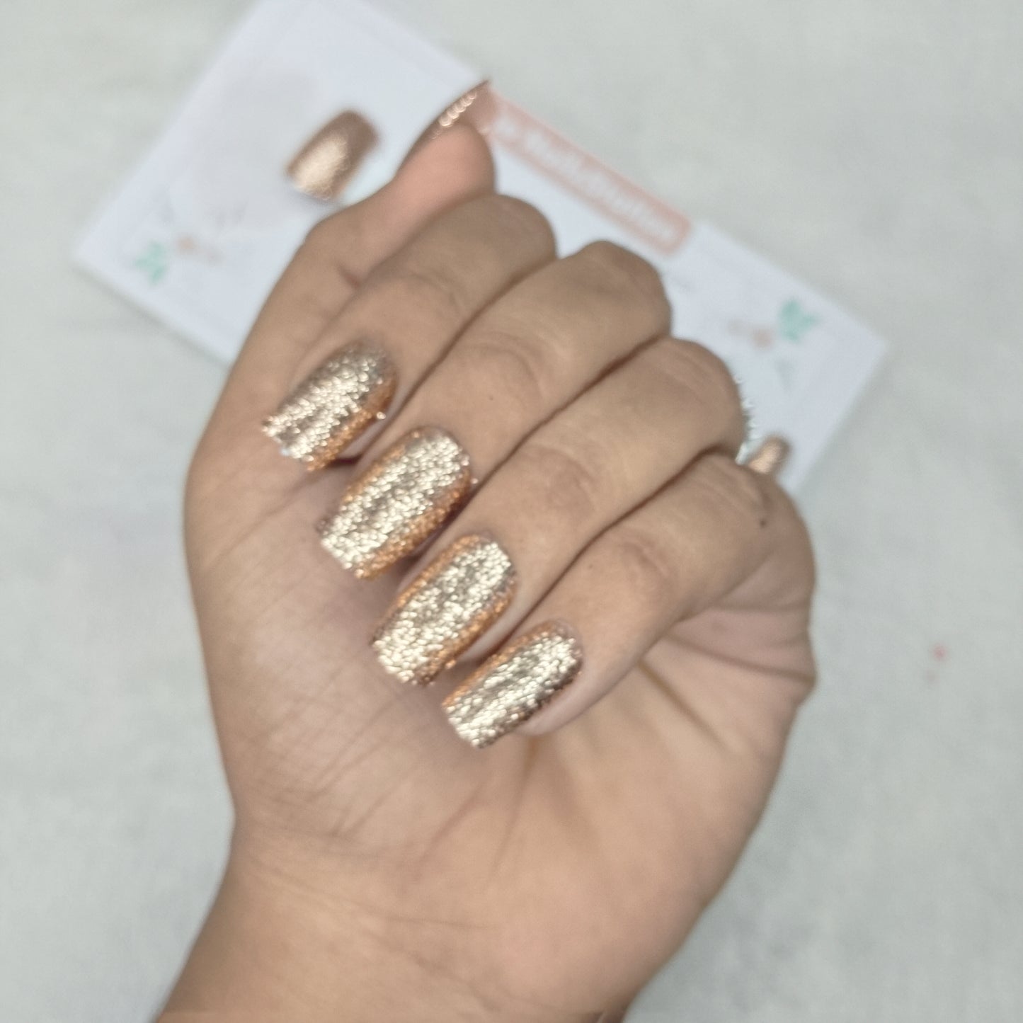 The NailzStation Glossy Golden Glitter Press on Fake Artificial Nails Set with glue, filer, sticker application kit // 1515