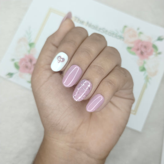 The NailzStation Glossy Light Pink Hearts Press on Fake Artificial Nails Set with glue, filer, sticker application kit // 1524